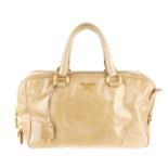 PRADA - a beige Boston handbag.