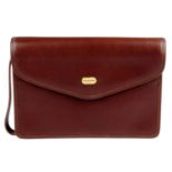 BURBERRY - a brown leather clutch.