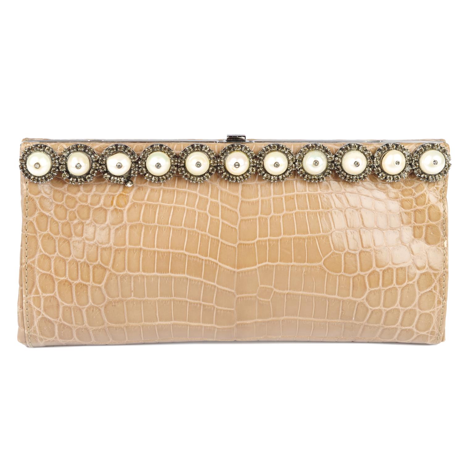 VALENTINO - a cultured pearl, rhinestone embellished crocodile clutch.