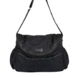 GUCCI - a black canvas satchel.