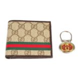 GUCCI - a Web GG Supreme bifold wallet and key ring.