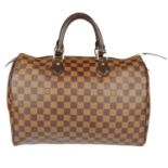 LOUIS VUITTON - a Damier Ebene Speedy 35 handbag.