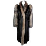 A full-length mink and silver fox fur coat.