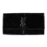 YVES SAINT LAURENT- a patent leather clutch.