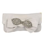 CHLOÉ - an embellished bow clutch.