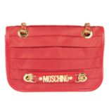 MOSCHINO - a red pleated nylon handbag.