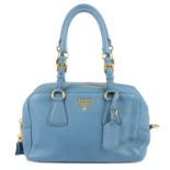 PRADA - a blue Vitello Daino handbag.