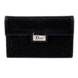 CHRISTIAN DIOR - a black wallet.