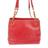 CHANEL - a vintage red Caviar leather handbag.