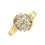 An 18ct gold diamond dress ring.Total diamond weight 0.55ct,