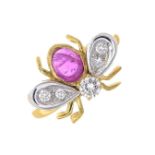 A bee ring, set with a ruby cabochon and diamonds.Estimated total diamond weight 0.20ct.Stamped