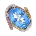 A blue topaz, diamond and vari-hue sapphire dress ring.