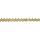 A diamond line bracelet.Estimated total diamond weight 1.75 to 2cts.Stamped 14K.Length 21cms.