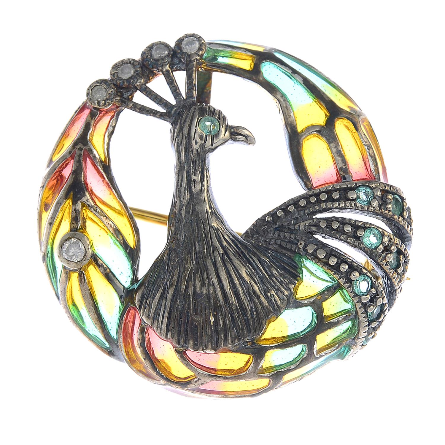 A diamond, emerald and plique-a-jour enamel peacock brooch.