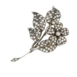 A late 19th century silver and gold diamond en tremblant floral brooch.