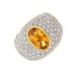 A diamond and citrine dress ring.Citrine calculated weight 1.55cts,