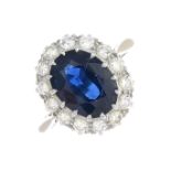 A sapphire and diamond cluster ring.Sapphire calculated weight 2.52cts,