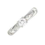 A diamond ring.Estimated total diamond weight 0.50ct,