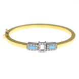 (64671) An 18ct gold diamond and howlite bangle.With Italian marks.Inner diameter 5.7cms.