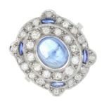 A mid 20th century platinum sapphire and diamond dress ring.Sapphire calculated weight 2.46cts,