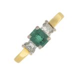 (54455) An 18ct gold emerald and diamond three-stone ring.Estimated total diamond weight