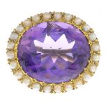 A late Victorian 9ct gold amethyst and split pearl cluster brooch.