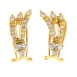 A pair of 18ct gold diamond earrings.Estimated total diamond weight 1ct.Hallmarks for