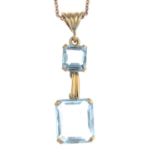 An aquamarine two-stone pendant,