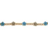 An early 20th century 9ct gold bracelet, set with turquoise and split pearl clusters.Length 18cms.