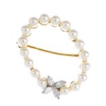 A cultured pearl and diamond brooch,