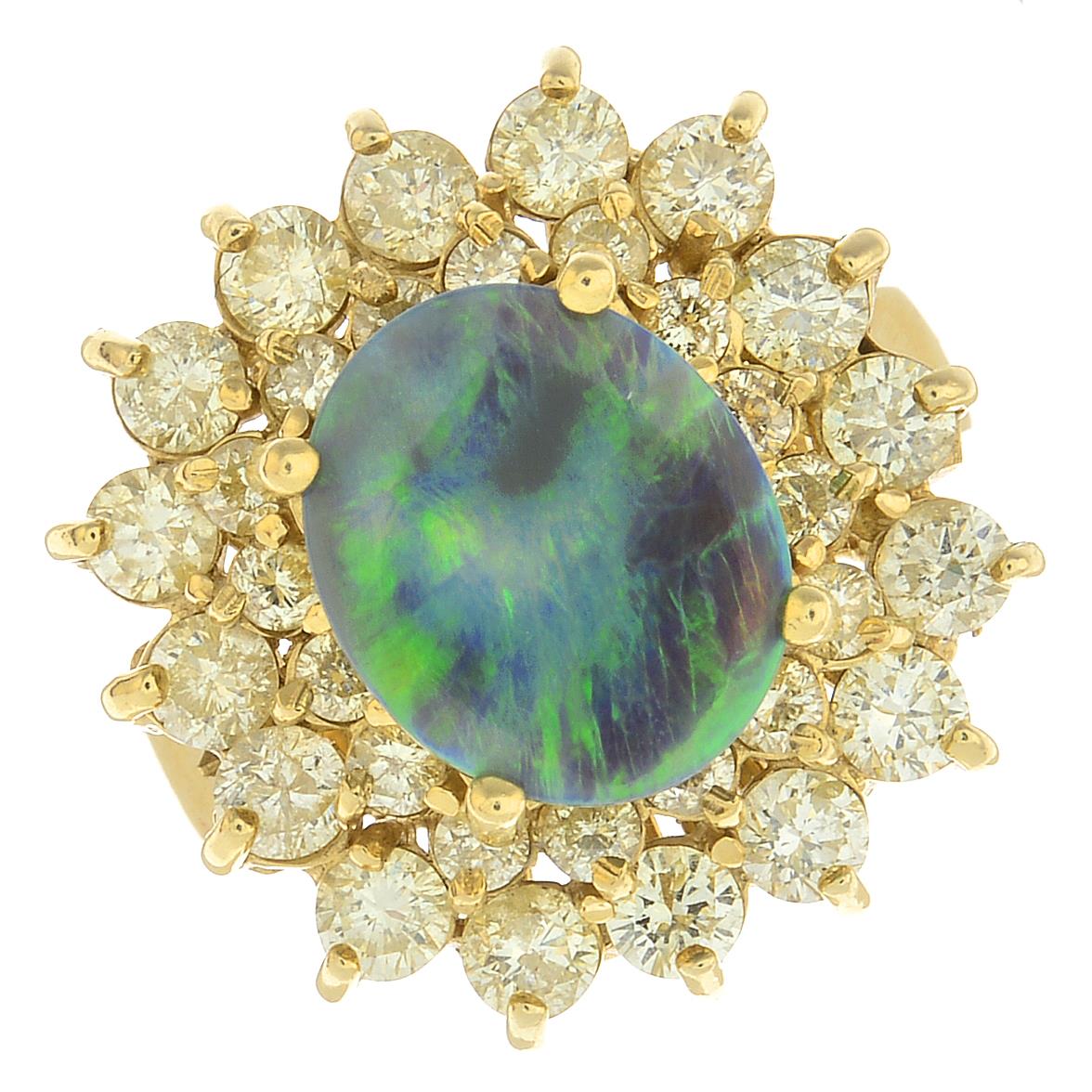 An opal and 'coloured' diamond cluster ring.Estimated total diamond weight 2cts.