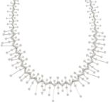 A spray necklace, set with diamonds.
