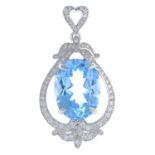 A topaz and diamond pendant.Topaz calculated weight 22cts,