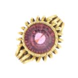 A pink tourmaline single-stone ring.Tourmaline calculated weight 4cts,