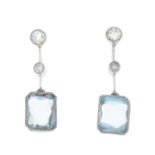 A pair of aquamarine and diamond earrings.