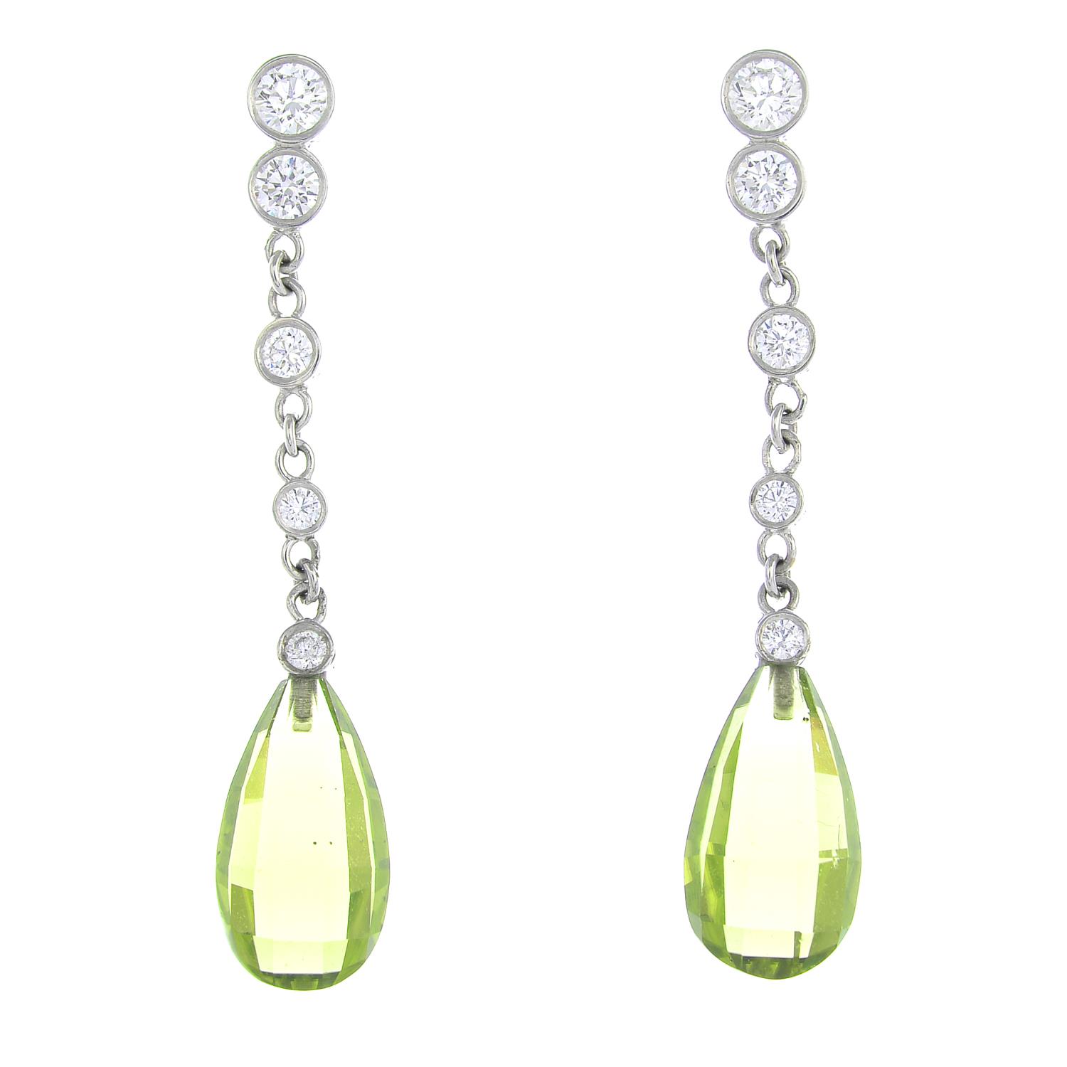 A pair of 18ct gold diamond and peridot drop earrings.