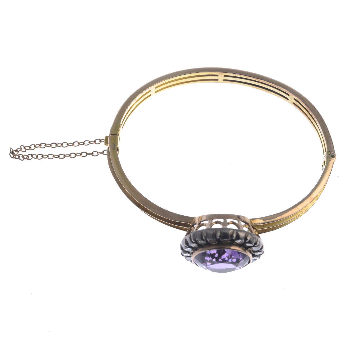 A late 19th century silver and gold amethyst and diamond bangle.Amethyst calculated weight - Image 2 of 2