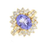 A tanzanite and diamond cluster ring.Tanzanite calculated weight 2cts,
