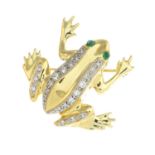 A diamond and emerald frog brooch.