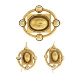 A late Victorian gold brooch and a pair of earrings.