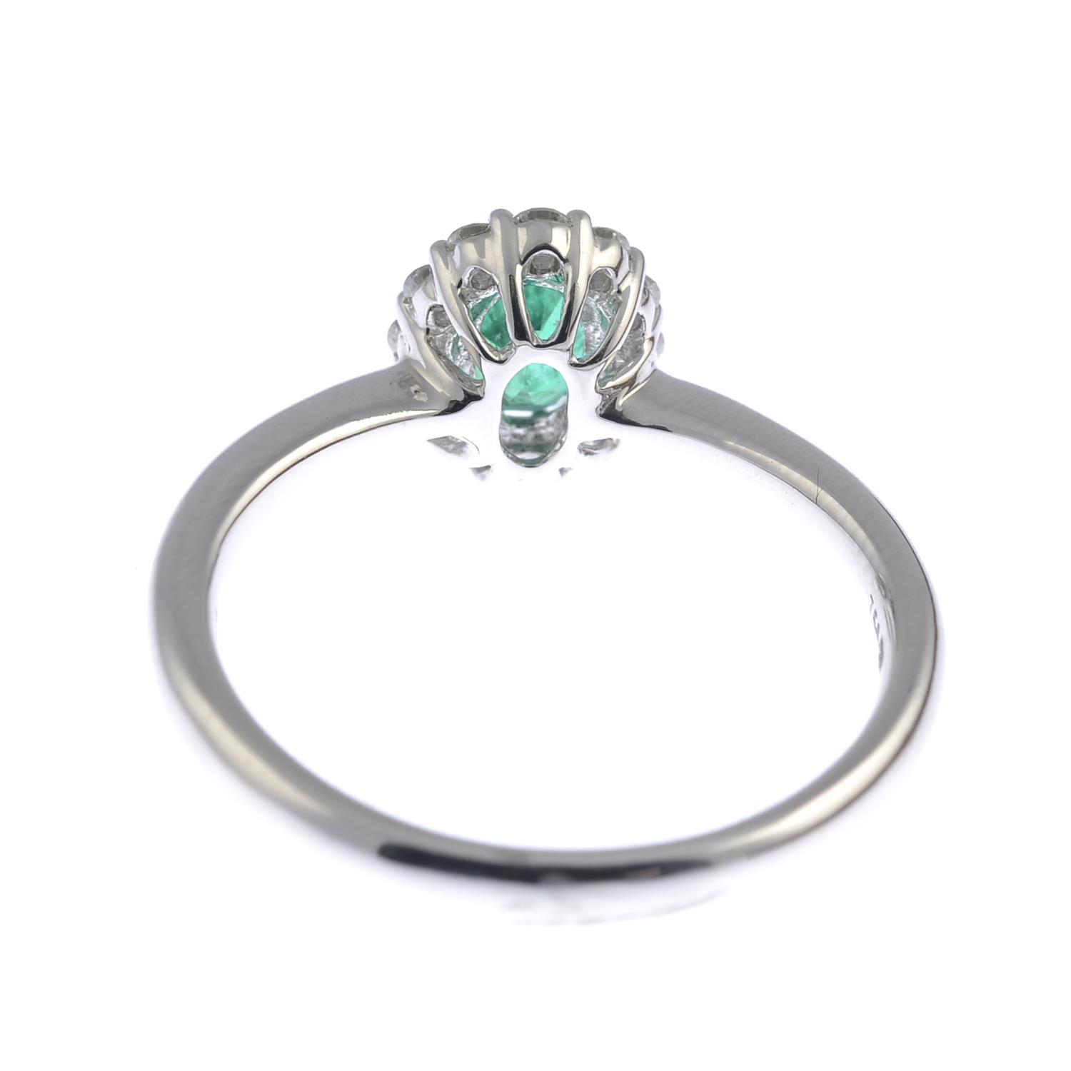An emerald and diamond cluster ring.Emerald weight 0.43ct, - Image 3 of 3