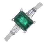 A platinum emerald and diamond three-stone ring.Emerald calculated weight 1.03cts,