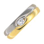 An 18ct gold diamond bi-colour band ring.Estimated diamond weight 0.15ct,