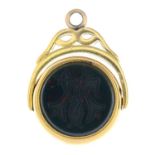 An early 20th century bloodstone and sardonyx swivel fob.Stamped 18ct.Length 2.7cms.