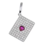 A ruby and diamond pendant.Ruby weight 0.35ct,