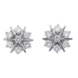 A pair of diamond cluster earrings.Estimated total diamond weight 1ct.Stamped 750.