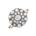 An early 20th century 18ct gold diamond cluster ring.Estimated total diamond weight 0.80ct,