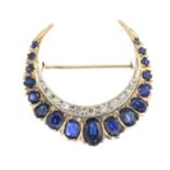 A 9ct gold sapphire and diamond crescent brooch.