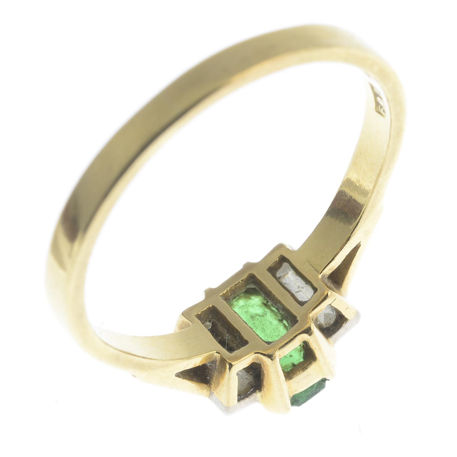 An 18ct gold emerald and diamond three-stone ring. - Image 3 of 3