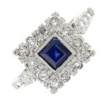 A sapphire and diamond cluster ring.